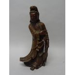 A Chinese lacquered and gilt wood figure of Guanyin, probably 19th century,