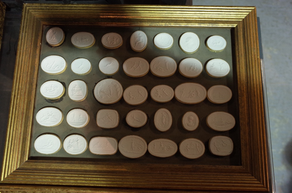 A quantity of plaster intaglios- probably 18th century, remounted in six modern giltwood frames, - Image 6 of 7