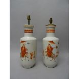 A pair of Chinese porcelain rouleau vases, 18th/19th century,