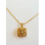 A gold and diamond set pendant, in a curved square design, mounted with circular cut diamonds,