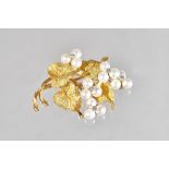 A gold, diamond and cultured pearl brooch, designed as a foliate spray,