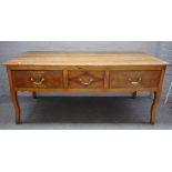 A 19th century French fruitwood dresser base,