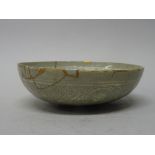 A Korean slip decorated `pomegranate' shallow bowl, Goryeo dynasty ( 918-1392),