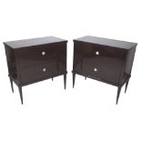 A pair of 20th century brown lacquer two drawer chests on tapering supports,