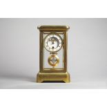 A rare and unusual French gilt-brass four glass year-going timepiece Circa 1870 The case of usual