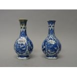 A pair of small Chinese blue and white bottle vases, Kangxi, of hexagonal form,