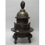 A large Chinese bronze censer, made in sections,