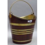 A George III style cooper bound elliptic peat bucket, 42cm wide x 34cm high.