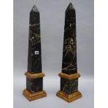 A large pair of Italian marble obelisks, 19th century, dark green vein with sienna plinth and knop,