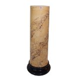 A 20th century yellow scagliola marble cylindrical column, 30cm wide x 112cm high.