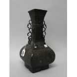 A Chinese bronze two-handled vase, probably 19th century, of square bottle form,