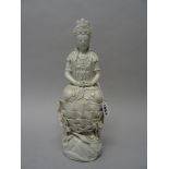 A Chinese blanc de chine figure of Guanyin, late Qing dynasty,