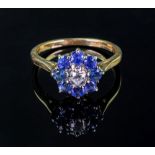 An 18ct gold, sapphire and diamond clust