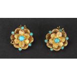 A pair of gold and turquoise clip earrin