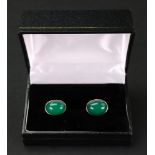 A pair of 9ct gold, green agate cufflink