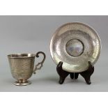 A Russian silver tea cup and saucer, Andrei Andreev Aleksandrov, Moscow 1888,