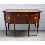 A Regency inlaid mahogany small bowfront sideboard, with four frieze drawers and turned supports,
