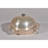 An early 20th century silver muffin dish with Argyle warmer base of good gauge,