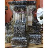 An early 20th century stone pedestal on three acanthus moulded supports 46cm wide x 50cm high.