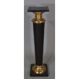 A 20th century brass and black painted metal jardinaire stand with square top on plinth base,