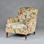Howard & Son's, Berner's Street; an easy armchair on tapering square mahogany supports,