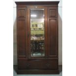 A Regency style mahogany single mirrored door wardrobe, 130cm wide x 190cm high.