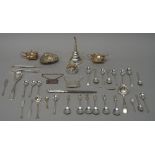 Silver, comprising; a wine funnel, London 1988, six apostle spoons, ten coffee spoons,