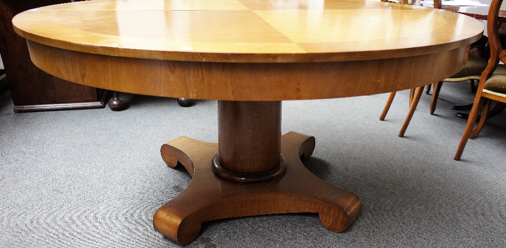 An Empire style walnut extending dining table, on turned column and four downswept supports, - Image 2 of 3