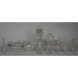 A group of cut glasswares, 19th century, comprising; a small urn and cover, 20cm. high; an urn 13cm.