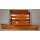 Harrods a 20th century walnut single sleigh bed, 103cm wide.