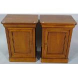 Harrods a pair of 20th century walnut single door bedside cupboards, 45cm wide, (2).