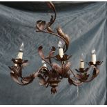A Rococo style gilt metal six branch chandelier, modern, decorated with foliate leaves,