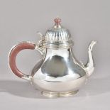 A Tiffany & Co England silver teapot, of baluster form,