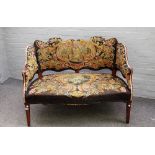 A late Victorian stained beech framed settee,