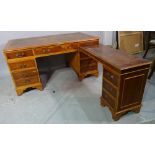A 20th century stained beech pedestal desk with tooled brown leather top, 152cm wide x 75cm high.