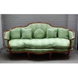 A Louise XV style beech framed canape/ sofa, with shaped back and seat on scroll supports,