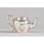 A Victorian silver teapot, with engraved decoration and oval cartouches, monogram engraved,