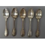 Twenty-one silver fiddle and thread pattern dessert spoons, varous dates and makers.