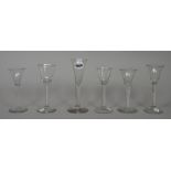 A group of six airtwist wine glasses, mid 18th century, various forms and sizes, (a.f), 15.25cm.