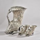 A set of three Italian silver-plated boar form rhytons, retailed by Christian Dior,