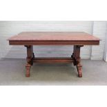 A 19th century French oak kitchen table,