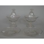 A pair of glass bon bon dishes, covers and stands, possibly French, circa 1870, circular form,