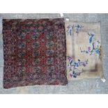 A Chinese rug and a Tekke Turkman rug, 106cm x 91cm, (2).