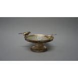 A silver pedestal bowl, of circular form,