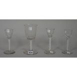 Four opaque twist wine glasses, circa 1765,