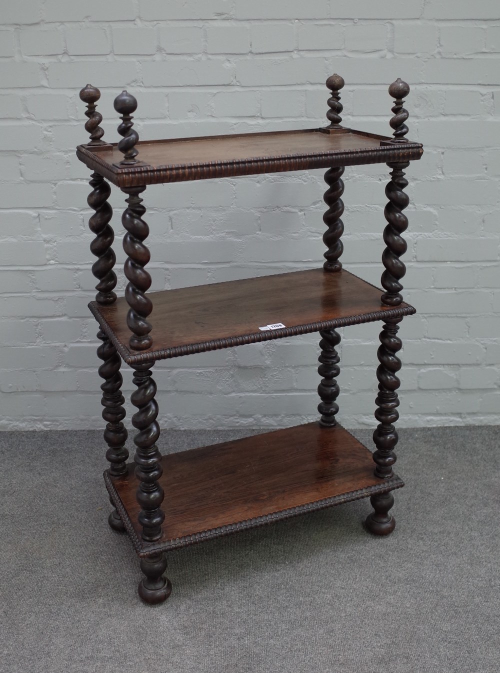 A 19th century Anglo-Indian rosewood three tier whatnot,