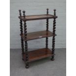 A 19th century Anglo-Indian rosewood three tier whatnot,