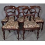 A set of five Victorian mahogany balloon back dining chairs, (5).