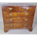 A 19th century mahogany chest of two short and three long drawers raised on bracket supports,