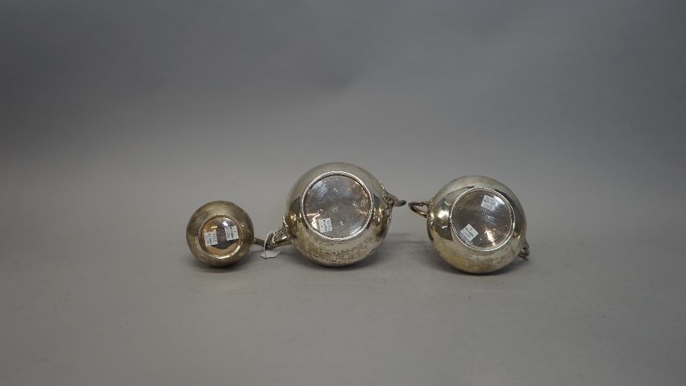 A Victorian silver three piece tea set, comprising; teapot, sugar bowl and milk jug, - Image 5 of 5